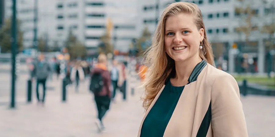 City background woman smiling at the camera.jpg PHOTOSHOP.jpg